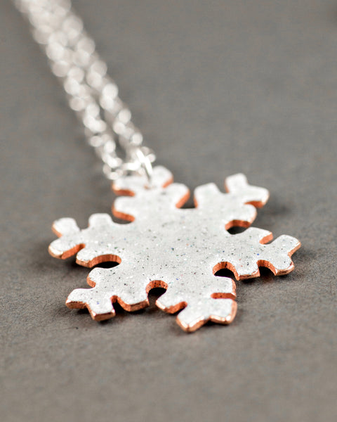 Reversible snow flake necklace